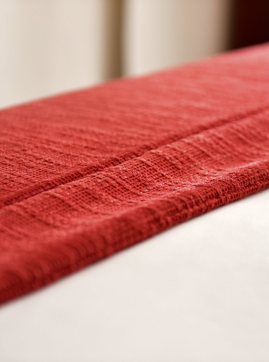 The Superior Double of The Pousada Marvão features a red bedspread folded at the foot of the bed