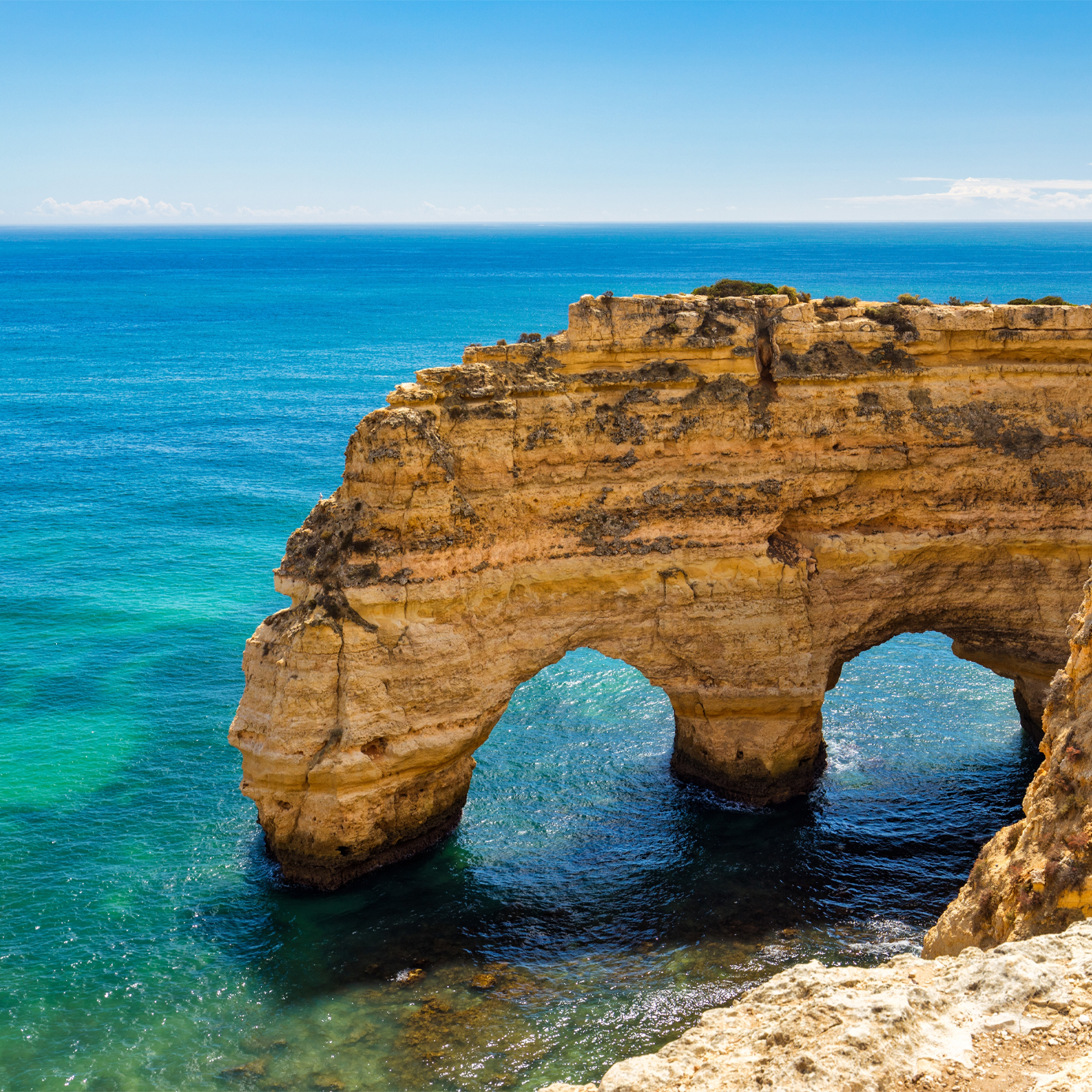 Algarve, Portugal Stay at a Pestana hotel and explore Algarve beaches and caves with crystal-clear waters.