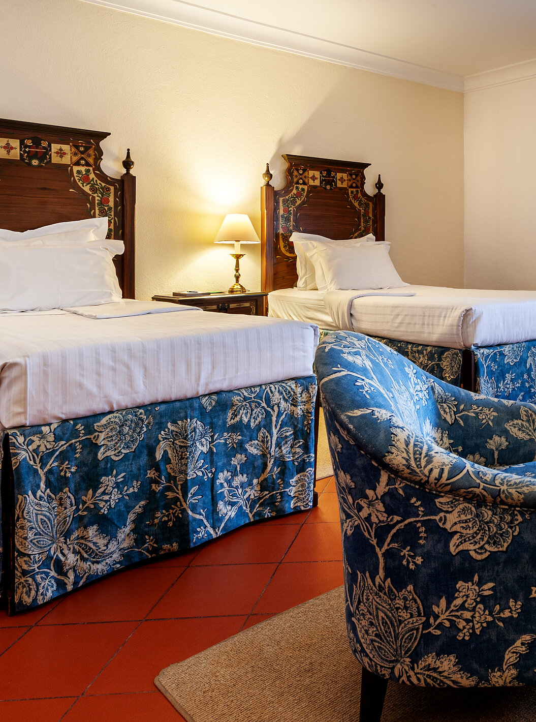 The Superior Double of The Pousada Marvão features two separate beds and two matching armchairs