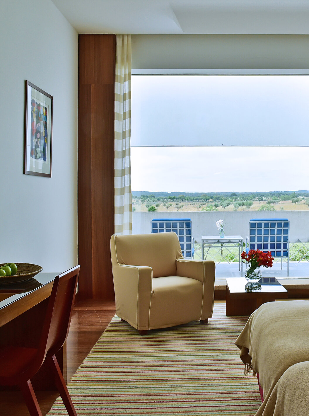 The Superior Room of The Pousada Mosteiro Crato has two joined single beds, an armchair, and a balcony with a table