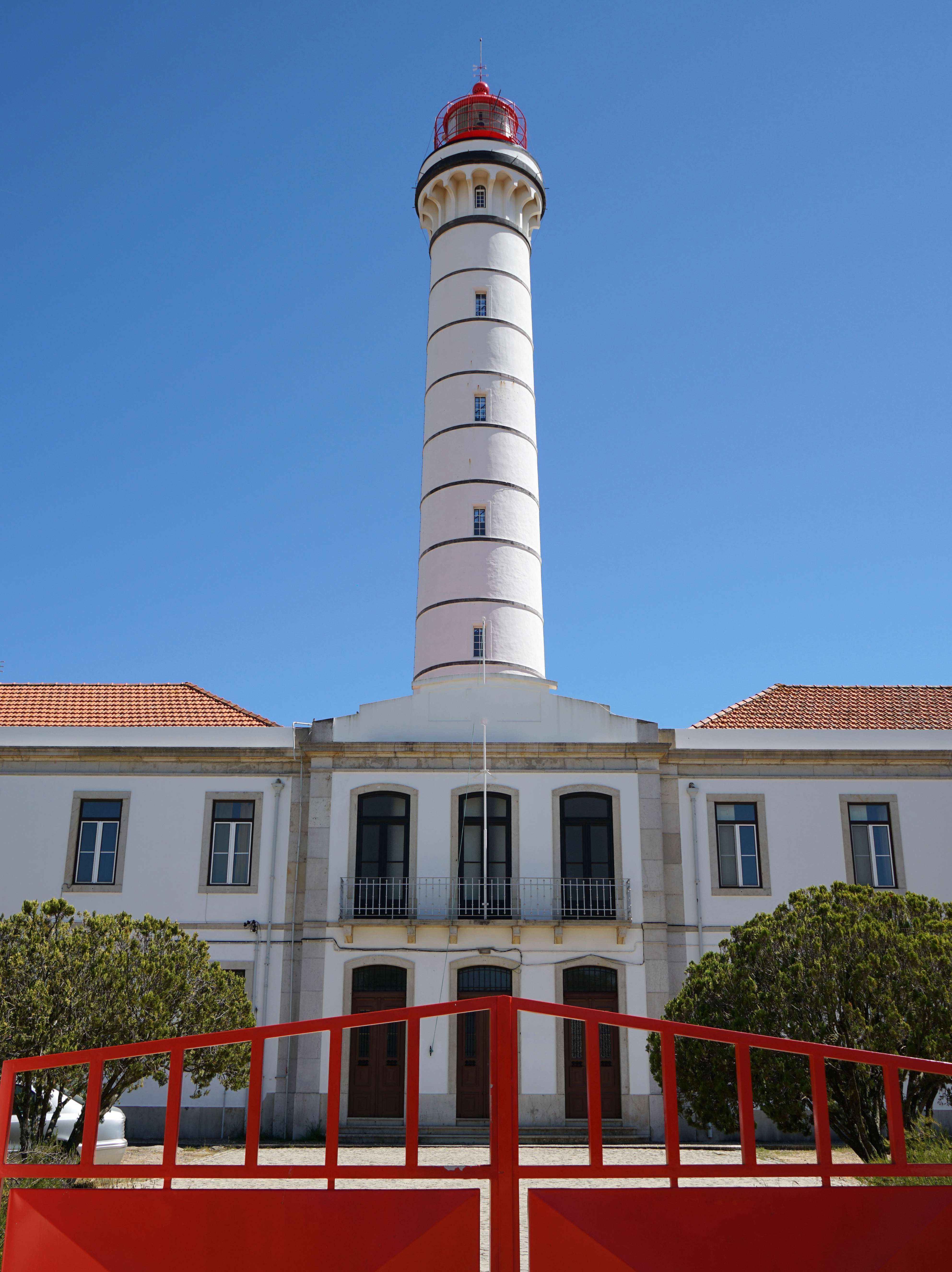 Lighthouse near Pousada Vila Real de Santo António, Hotel Histórico Perto da Praia under blue sky view