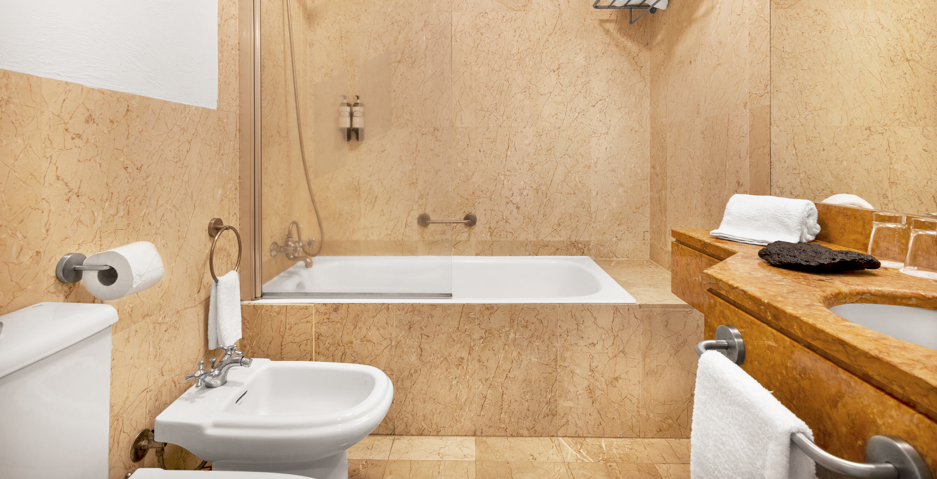 The Classic Room, City View of The Pousada Forte Horta has a bathroom with sink, bathtub with shower, and towel