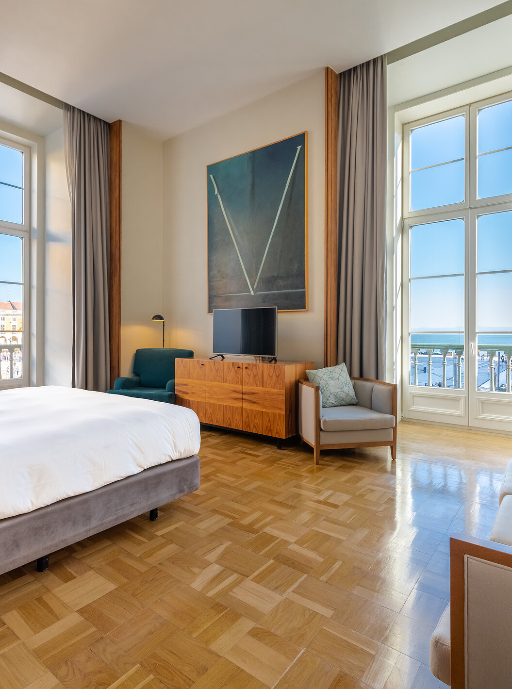 The Praça do Comércio King Size Bed Suite at Pousada Lisboa Praça do Comércio has a river view, with a sofa and TV