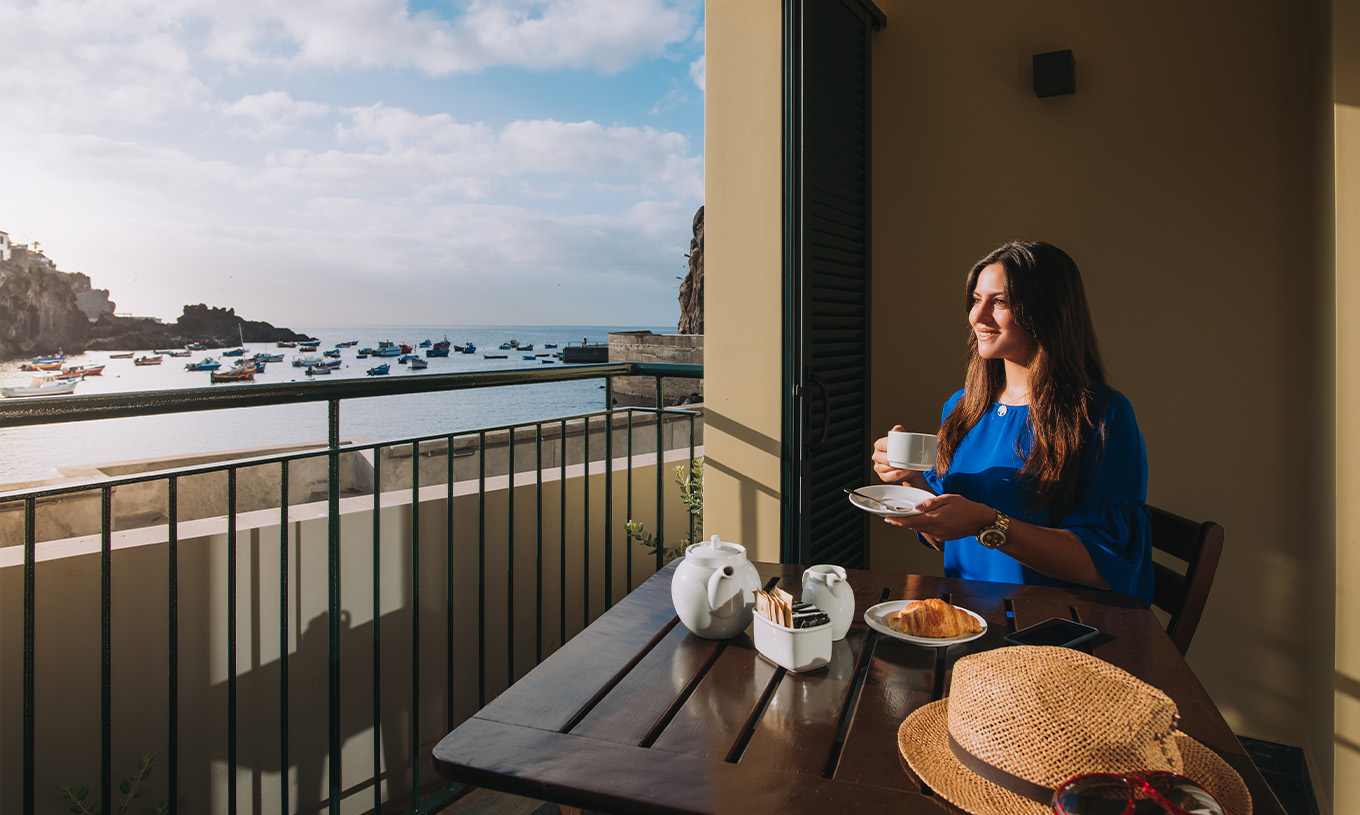 The Deluxe Bay View Room at Pestana Churchill Bay has a balcony with a sea view, where you can have breakfast