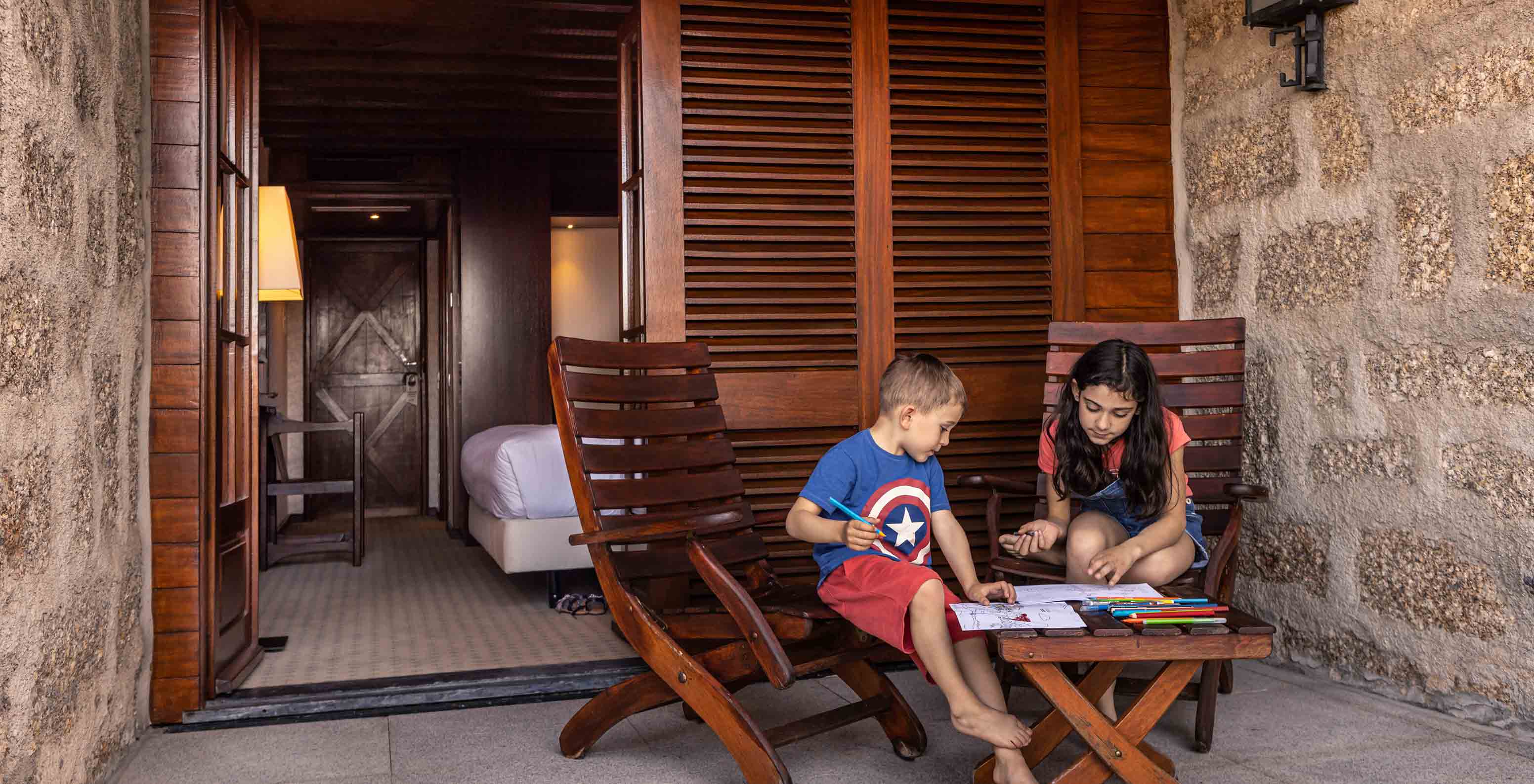 The Standard Suite at Pousada Caniçada - Gerês has a balcony with a table and chairs, ideal for children to play
