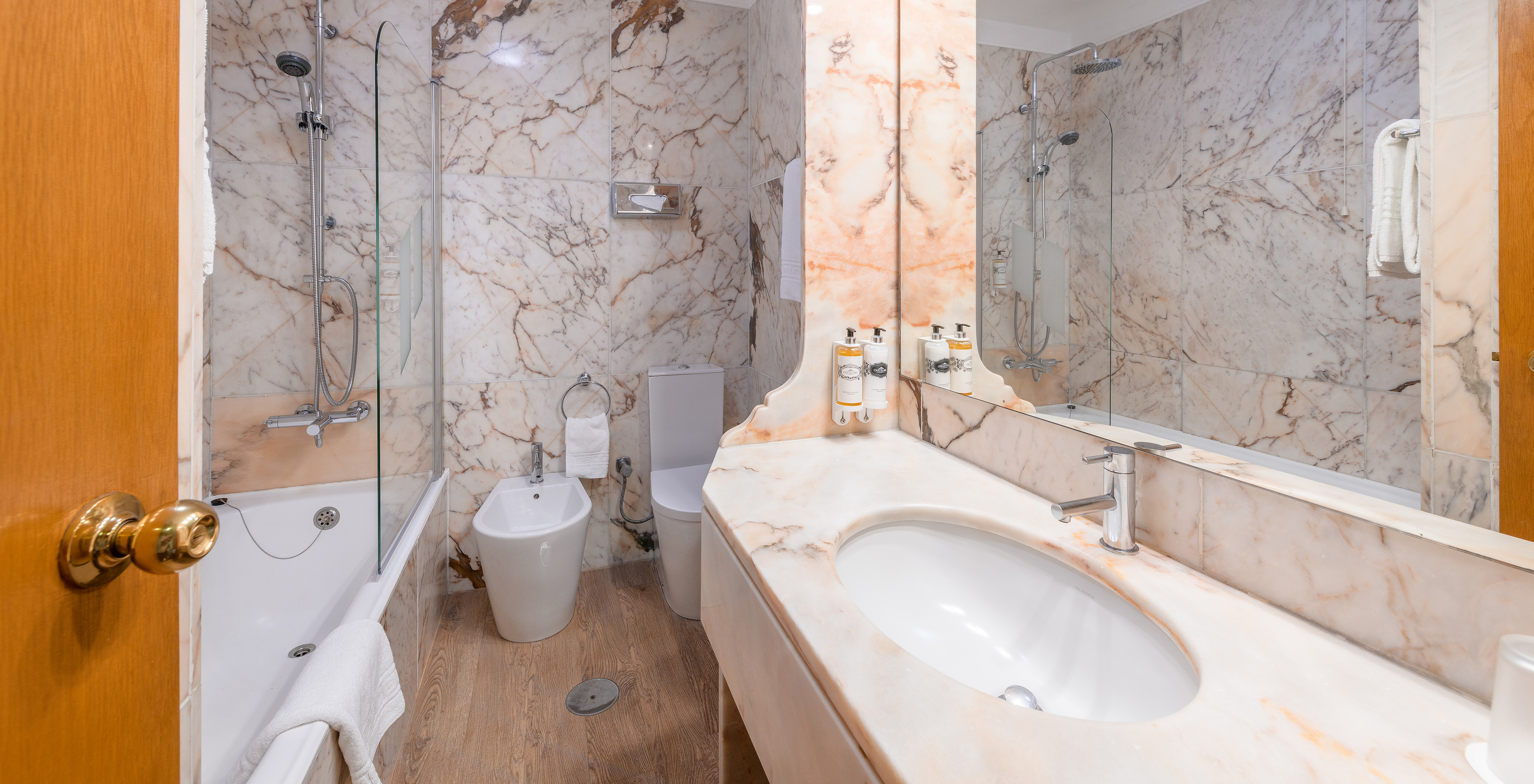 The Classic Room of The Pousada Viana do Castelo has a bathtub with a shower and a counter with a marble sink