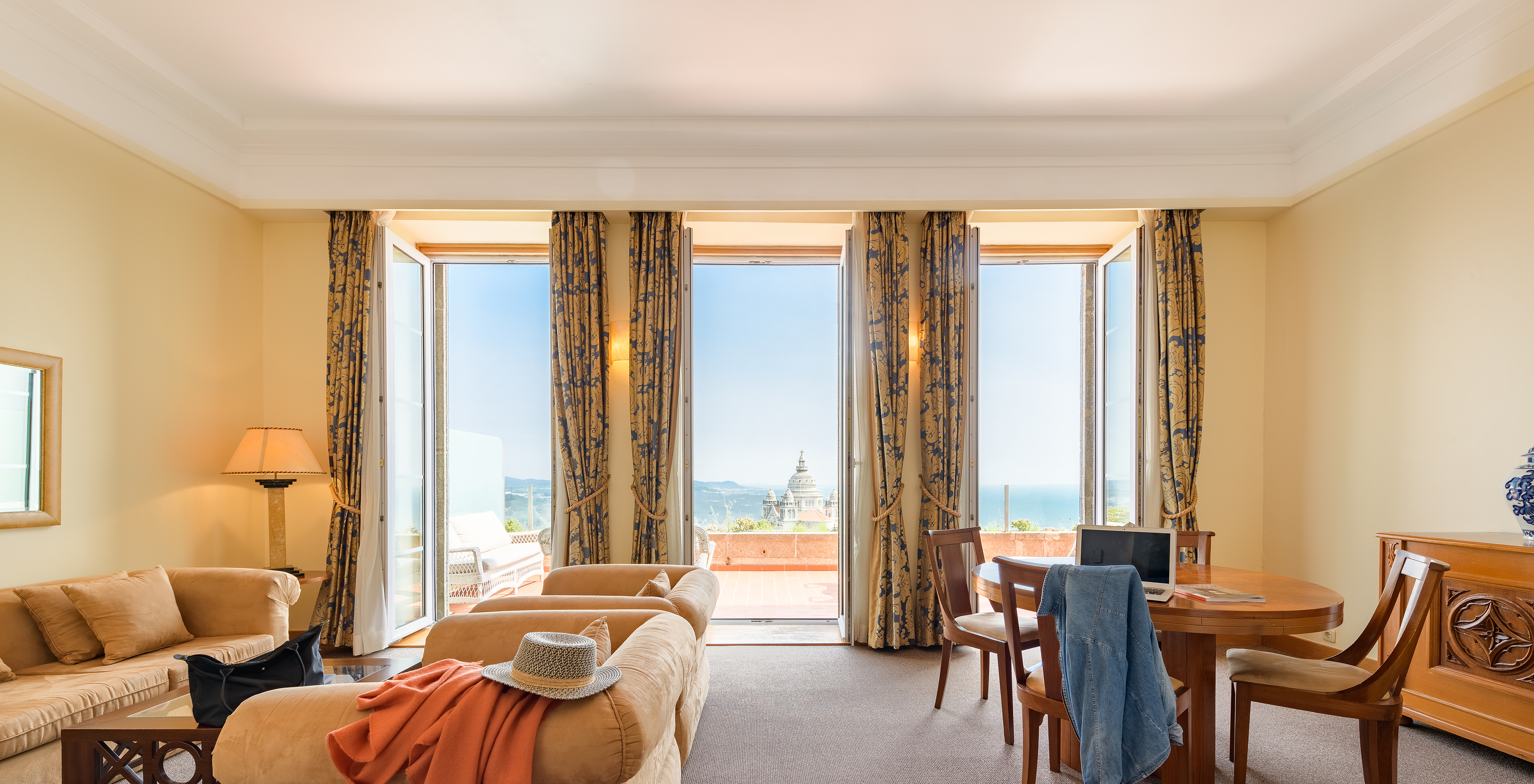 The Special Suite of The Pousada Viana do Castelo has a living room with sofas, tables, and a balcony