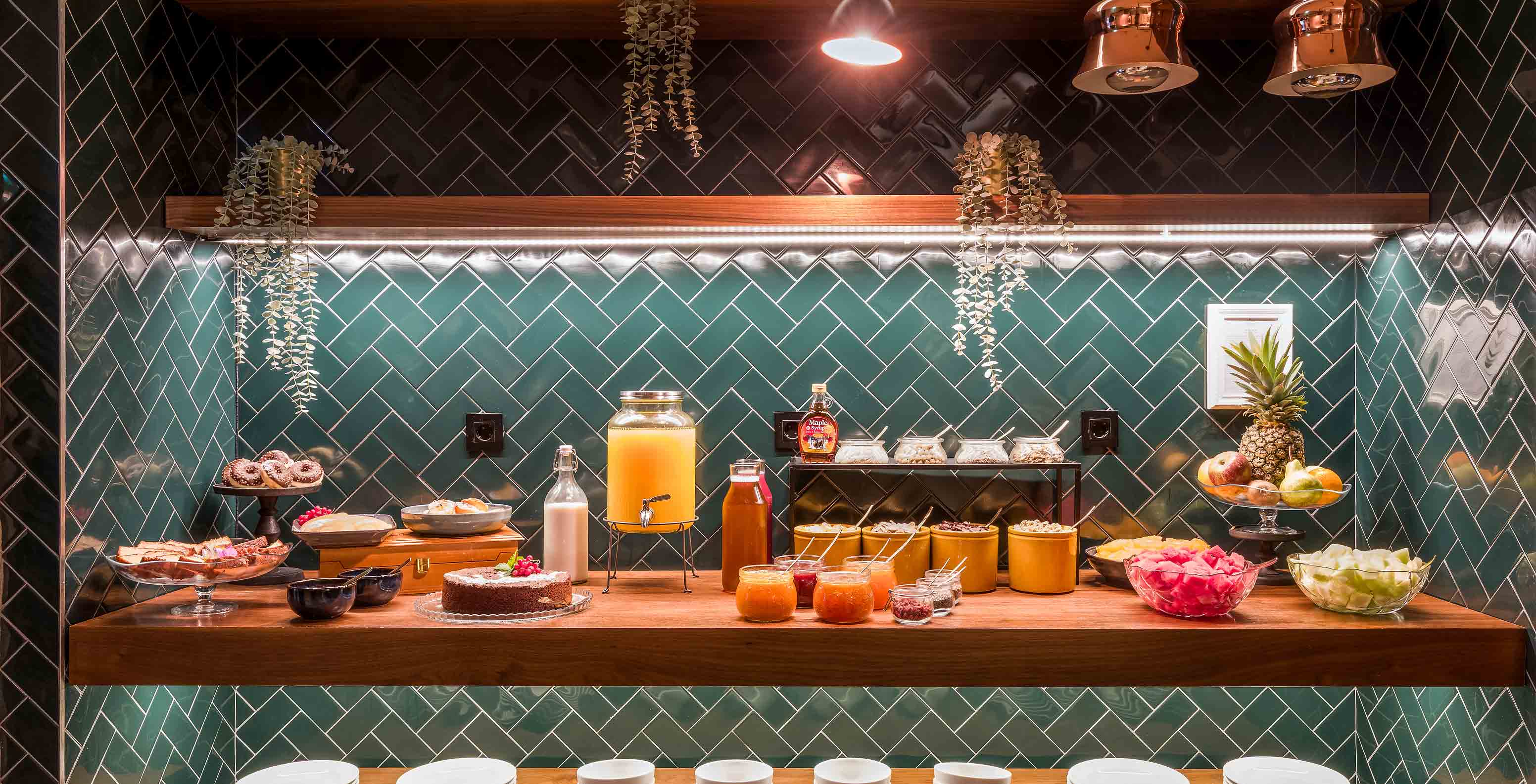 The breakfast at Pousada do Porto, a hotel in the center of Porto, includes juices, jams, fruits, and cakes