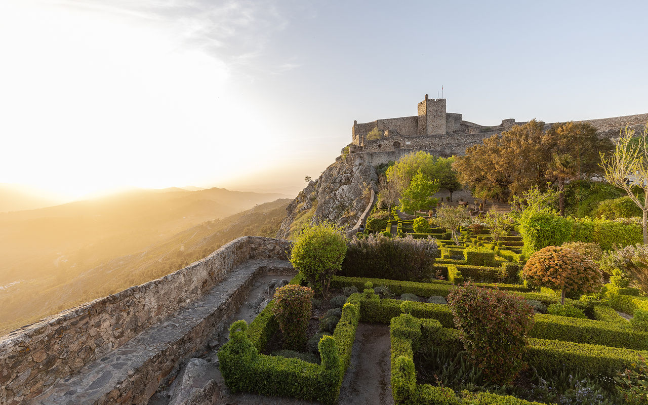 Exterior view of Pousada Marvão, a historic hotel in Marvão situated on a hill, surrounded by nature
