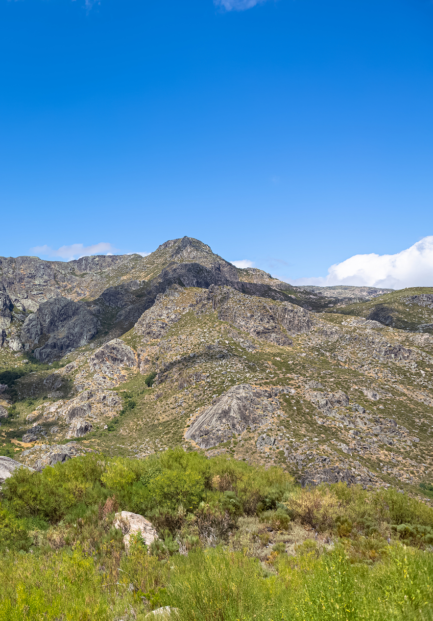 Natural park of Serra da Estrela with imposing mountains and valleys with green vegetation