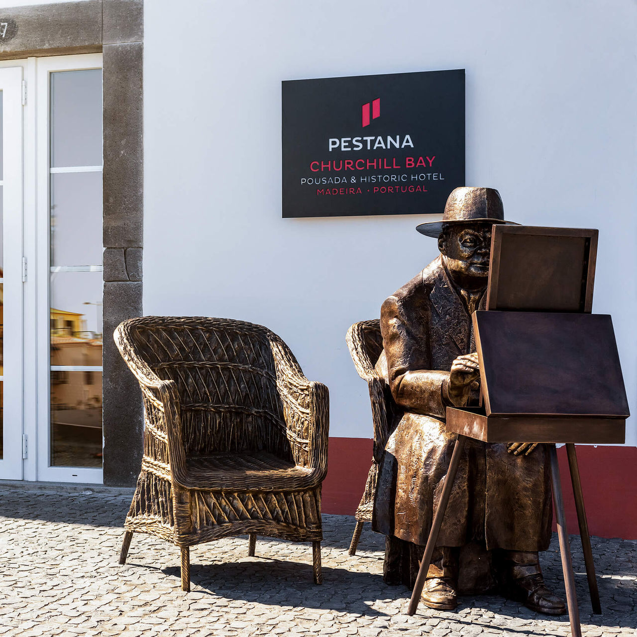 Churchill statue in front of Pestana Churchill Bay, a hotel in Câmara de Lobos Bay near Funchal