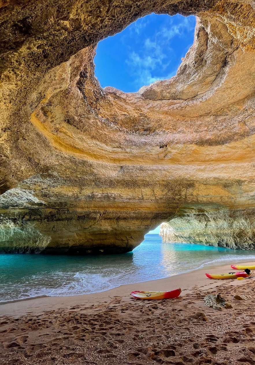 Stay at Pousada Sagres and take a boat or canoe ride to the Benagil cave and discover its crystal clear waters