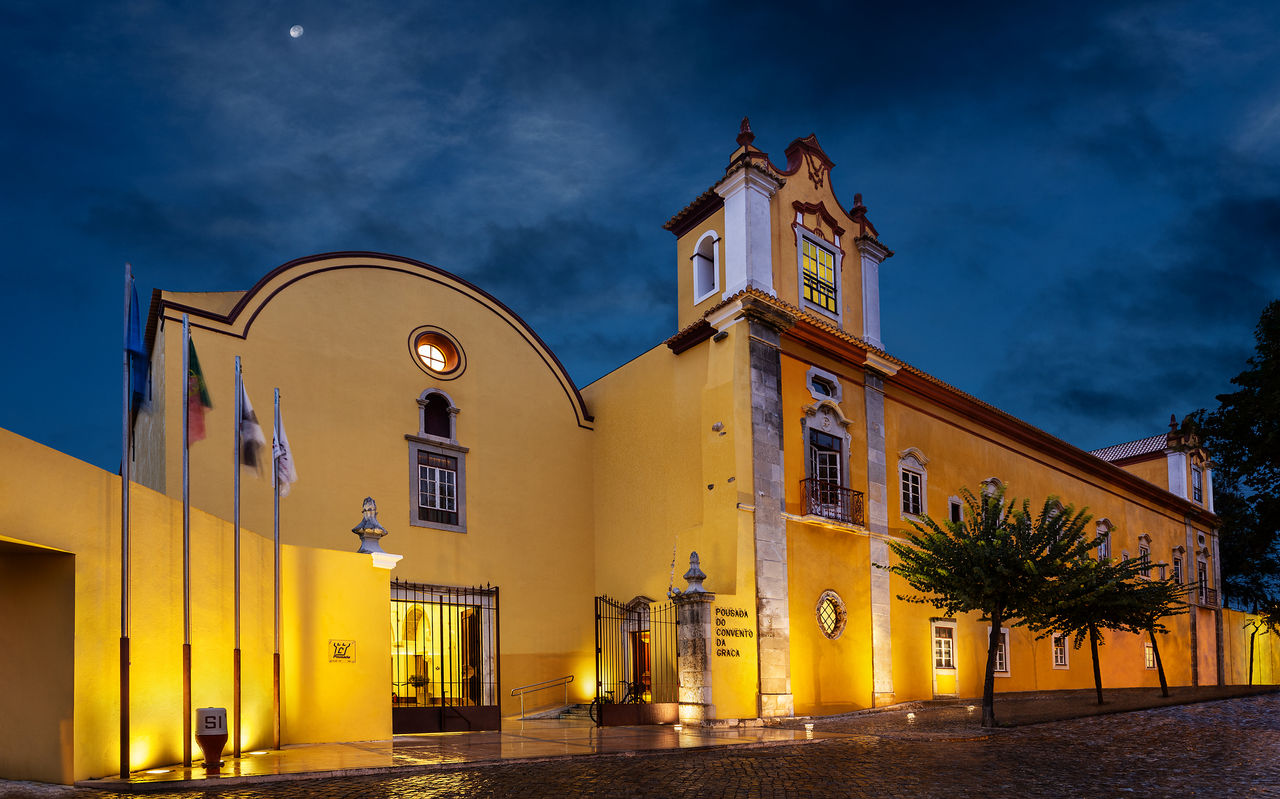 Illuminated building of Pestana Tavira, a historic hotel in Tavira, former Convent of Nossa Senhora da Graça