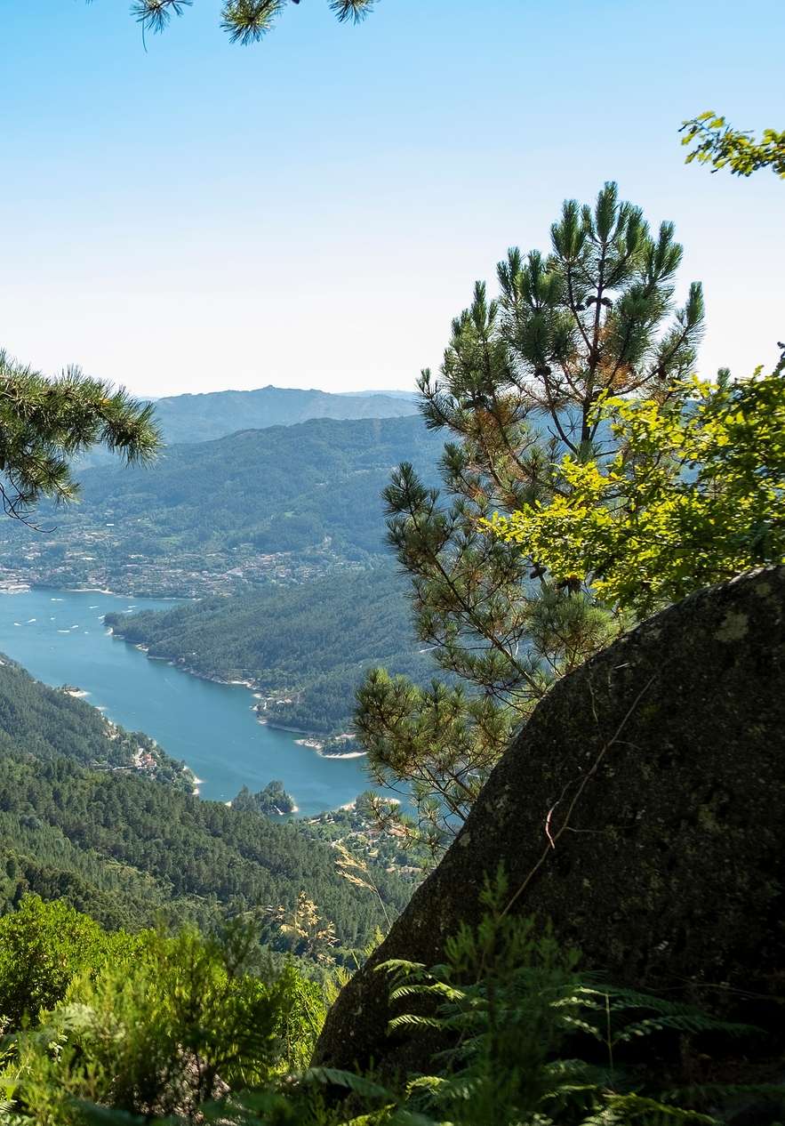 Top view of a mountain in the Douro valley surrounded by vegetation and mountains in Peneda-Gerês
